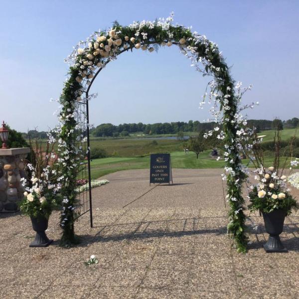 Fresh green garland designed with all faux champagne and ivory flowers. Designed at Rush Creek Golf Course in Maple Grove MN.