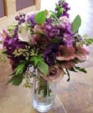 Antique lavender roses, dark and light purple stock, seeded eucalyptus. 