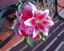 Locally grown hot pink dahlias, hot pink roses, stargazer lilies, accented with hosta leaves.