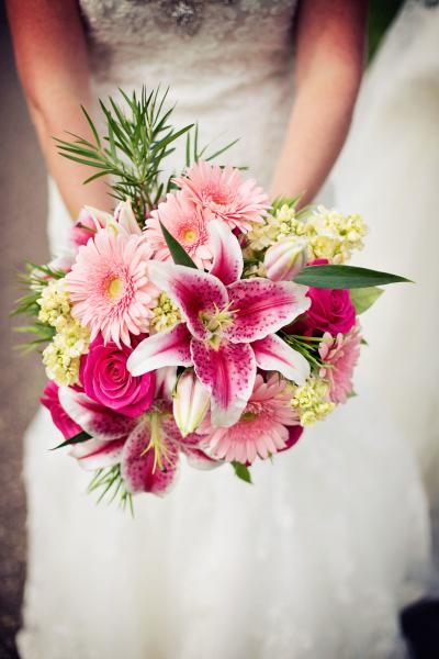  Beautiful roses, gerbera daisies, mini hydrangea and stargazer lilies.