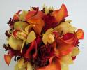 This unique bouquet was designed with orange miniature calla lilies, yellow cymbidium orchids, kangaroo paws and roses.