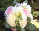 Roses, standard mums, freesia, seeded eucalyptus