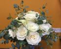 Beautiful white roses with a variety of eucalyptus.