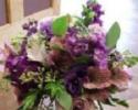Antique lavender roses, dark and light purple stock, seeded eucalyptus. 