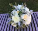 Ivory roses, standard mums, seed eucalyptus, dusty miller.