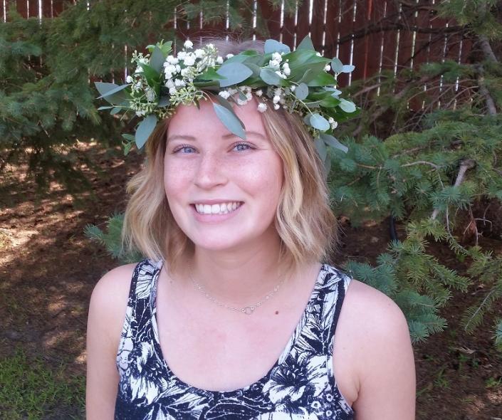  Fresh head wreath with a variety of greens, eucalyptus, ruscus and babies breath.