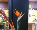 Perfect for a tropical event or island theme. Bird of paradise and orange asiatic lilies.